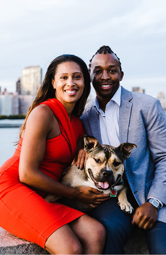 Couple enjoying time with their new puppy